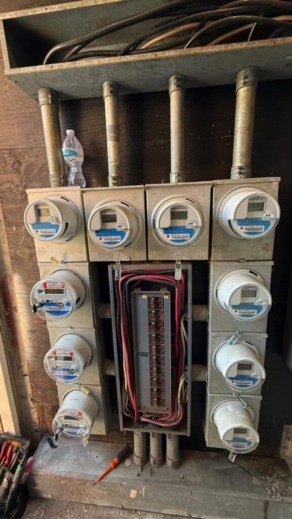 Obsolete multi-meter electrical room in an older South Florida building
